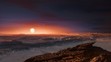 Umělecké zobrazení povrchu Proximy b a hvězdy Proxima Centauri