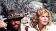 Richard Chamberlain a Sharon Stone ve filmu Doly krále Šalamouna, 1985