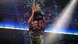Gerwyn Price s trofejí pro mistra světa