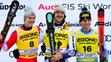 Stupně vítězů: zleva druhý Marco Odermatt, vítěz Jan Zabystřan a třetí Giovanni Franzoni