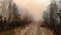 Požár v okolí Černobylu je po deseti dnech pod kontrolou, tvrdí Ukrajina