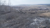 Firma měla na haldu navést stavební odpad místo zeminy. Hrozí jí milionová pokuta