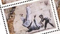 Dítě přepralo Putina. Ukrajina vyrobila známky k výročí války