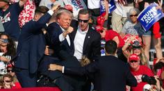 Pokus o atentát na Trumpa. Střelec ho na mítinku trefil do ucha, útočníka zabili agenti