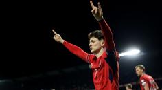 Krejčí jako Rosický. Kapitán reprezentace slavil gól ikonickým gestem