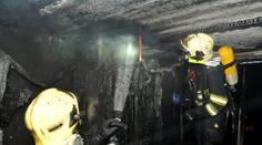 Požár bytu v Praze způsobil škodu za miliony, 26 evakuovaných