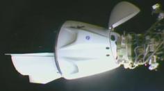 K vesmírné stanici přiletěli čtyři astronauti. Vynesla je použitá loď