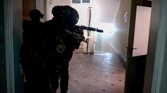Řež na jihu Ruska. Ozbrojenci zastřelili přes deset policistů a podřízli kněze