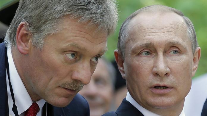 Dmitrij Peskov a Vladimir Putin