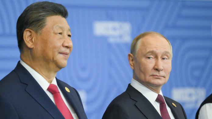 Prezidenti Si Ťin-pching a Vladimir Putin