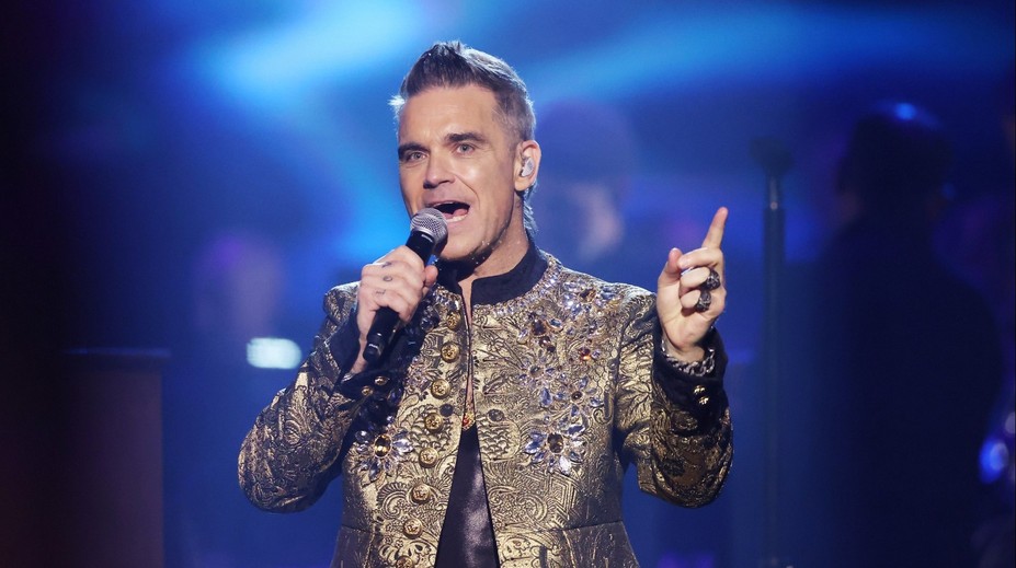 Zpěvák Robbie Williams slaví padesátiny, kariéru začínal velmi mladý