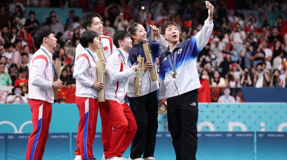Konflikt stranou. Olympionici z Jižní a Severní Koreje si udělali selfie