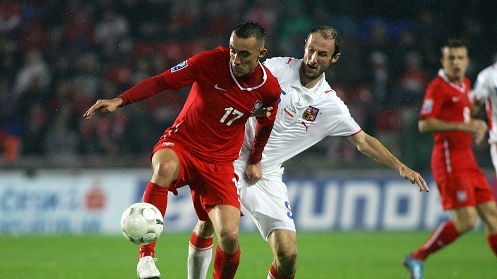 Roman Hubník v souboji s Ireneuzsem Jeleněm