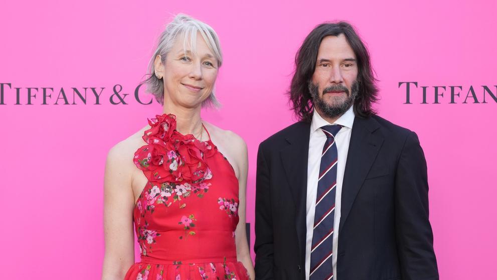 Keanu Reeves s partnerkou
