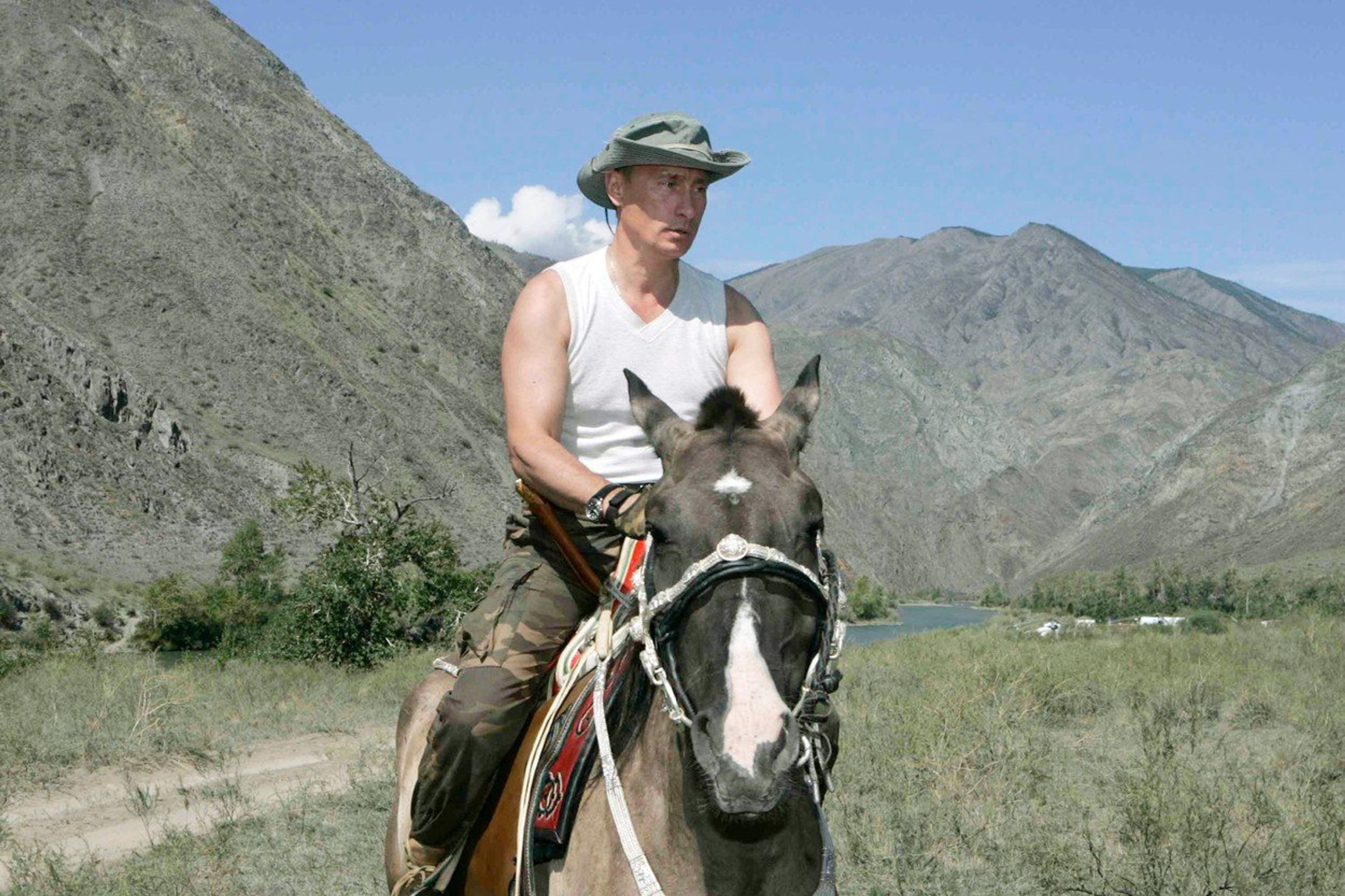 Vladimír Putin na dovolené - GALERIE: Prezidenti na dovolené a jejich outfity (7/9)