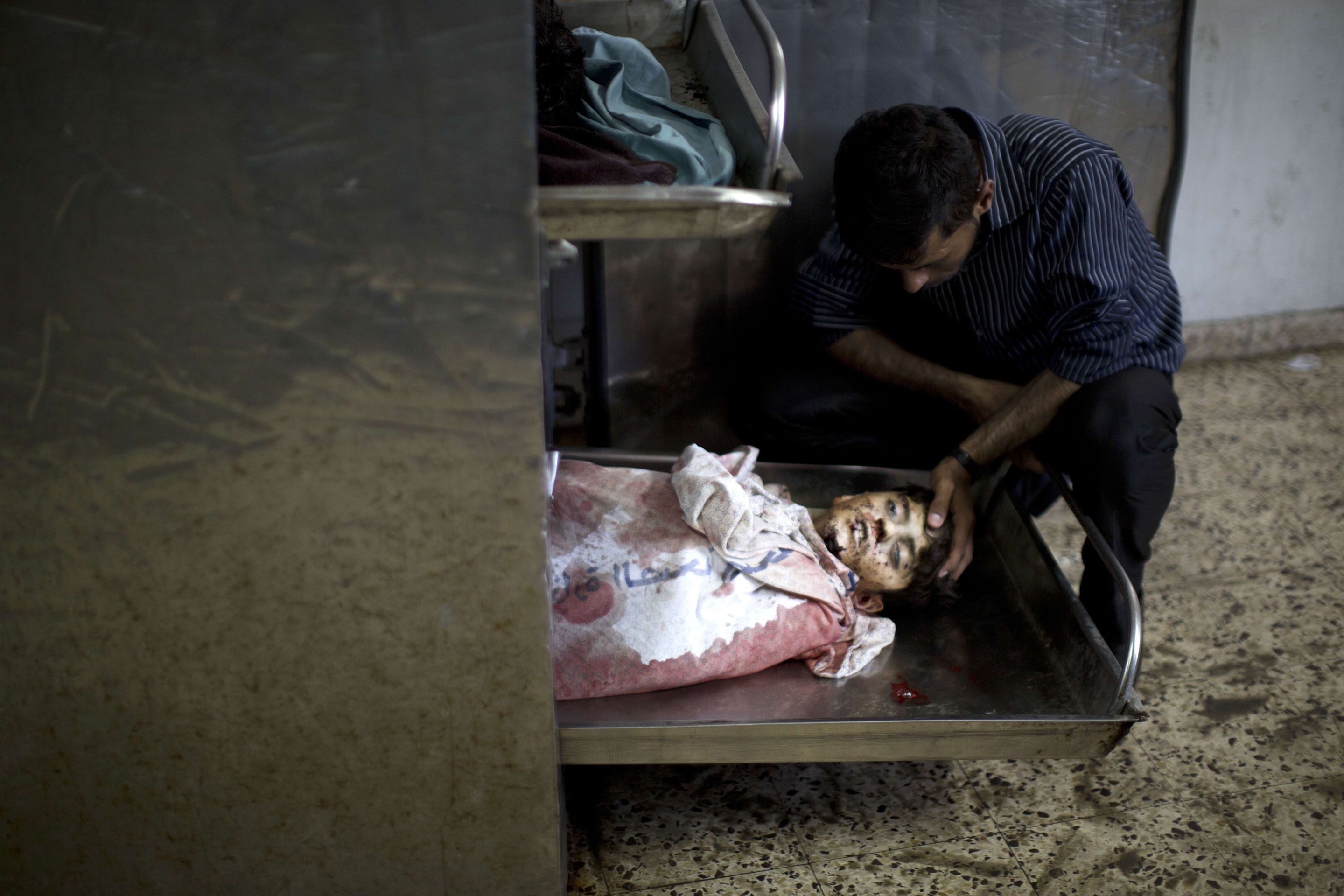 Válka v pásmu Gazy - 3 - FOTOGALERIE OD 18 LET: Smrt v pásmu Gazy (3/13)