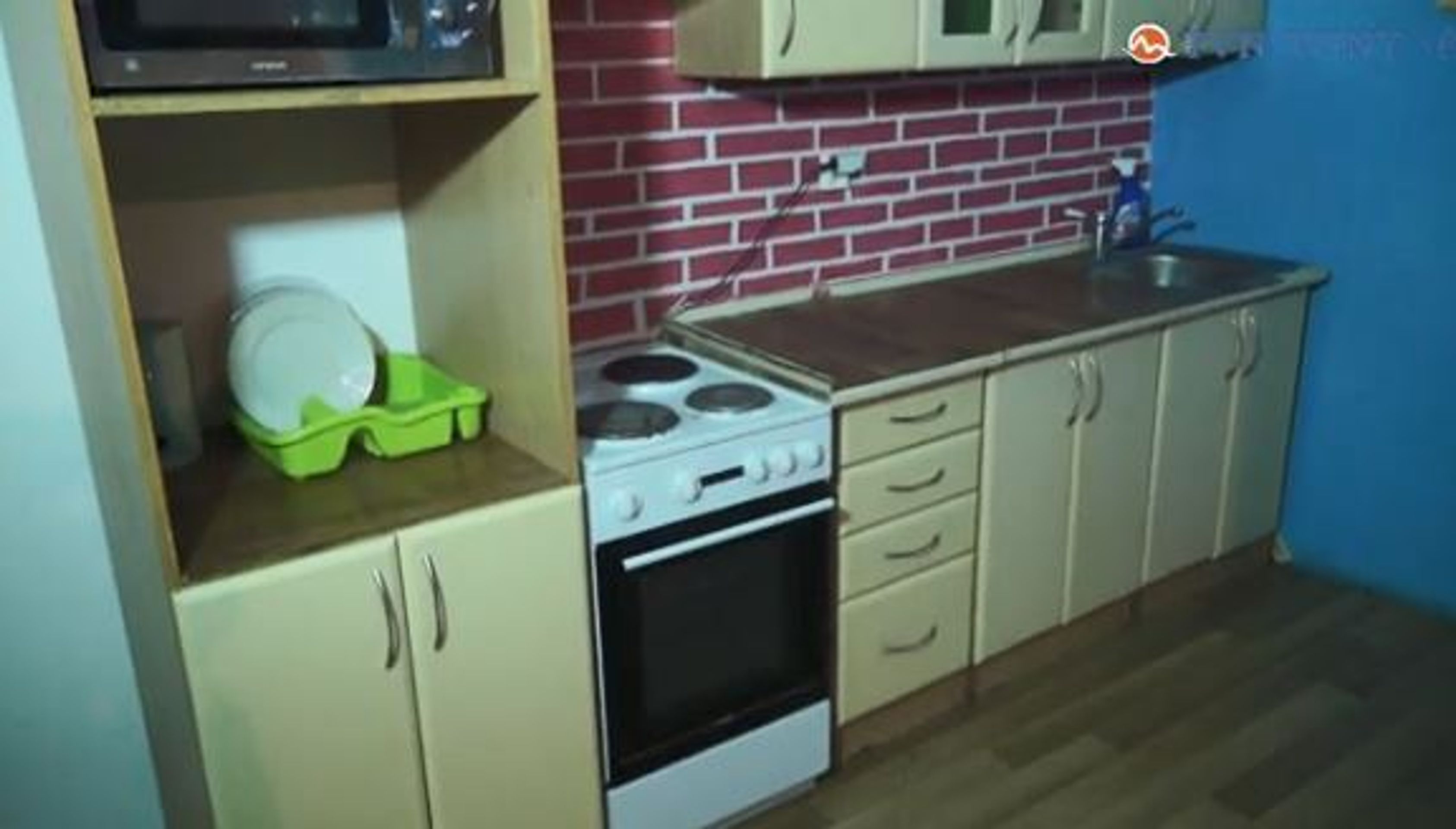 Romskou osadu přestěhovali do bytovky - 2 - GALERIE: Romskou osadu srovnali se zemí (8/9)