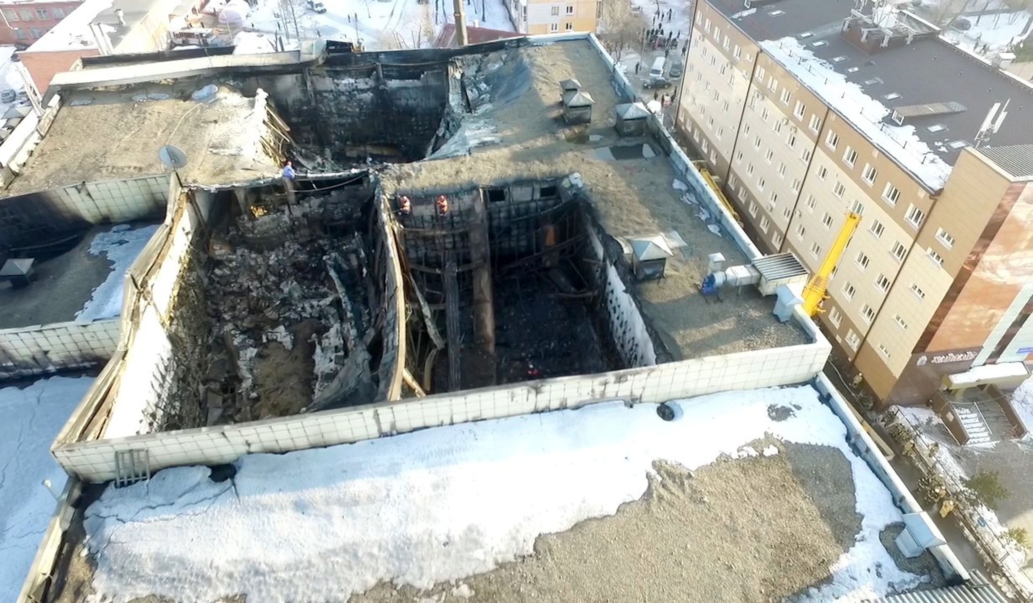 Vyhořelý obchodní dům v Kemerovu - GALERIE: Požár obchodního centra v Rusku (7/9)