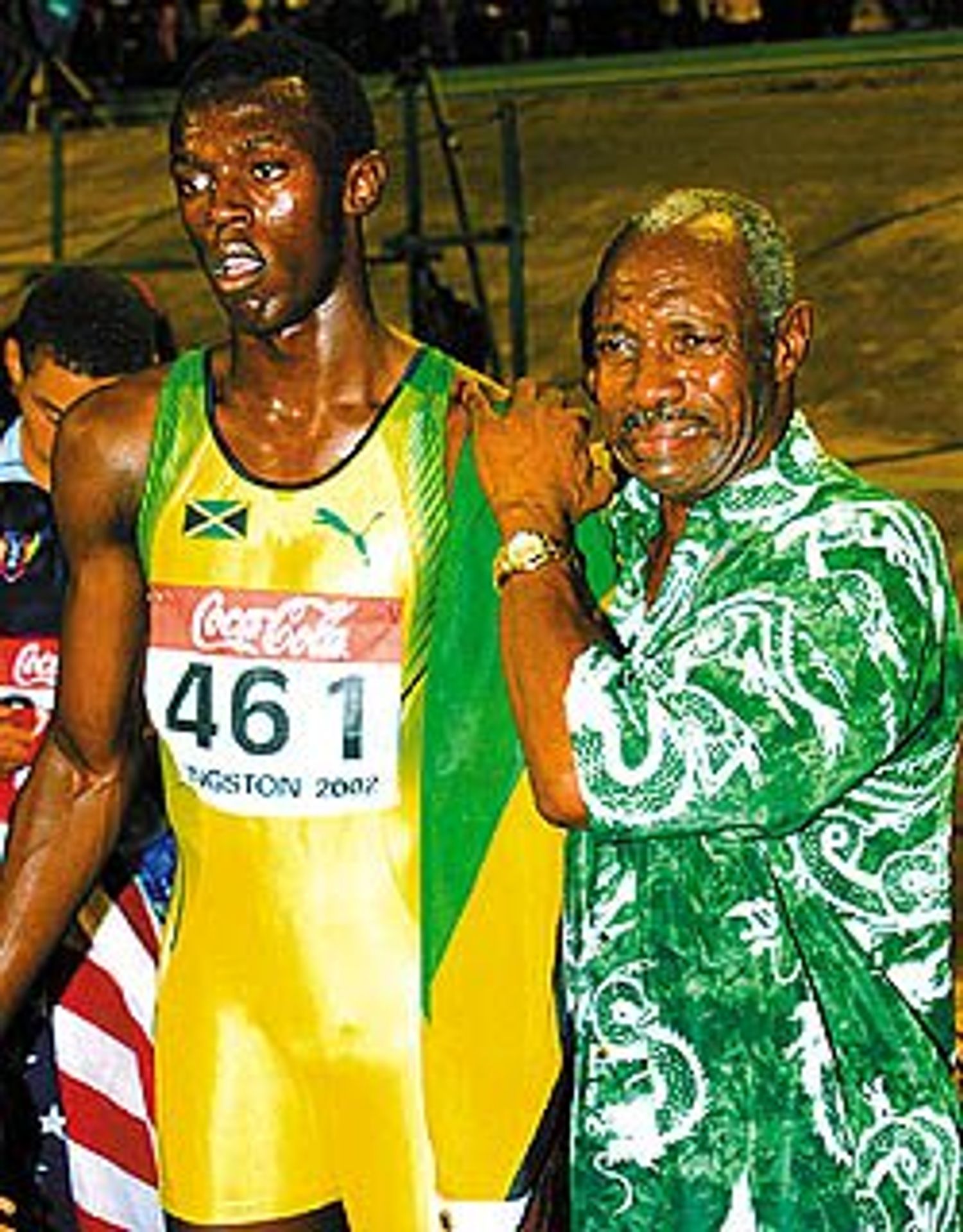 Usain Bolt se svým prvním trenérem - Galerie: Jak se změnil Usain Bolt v průběhu let (8/8)