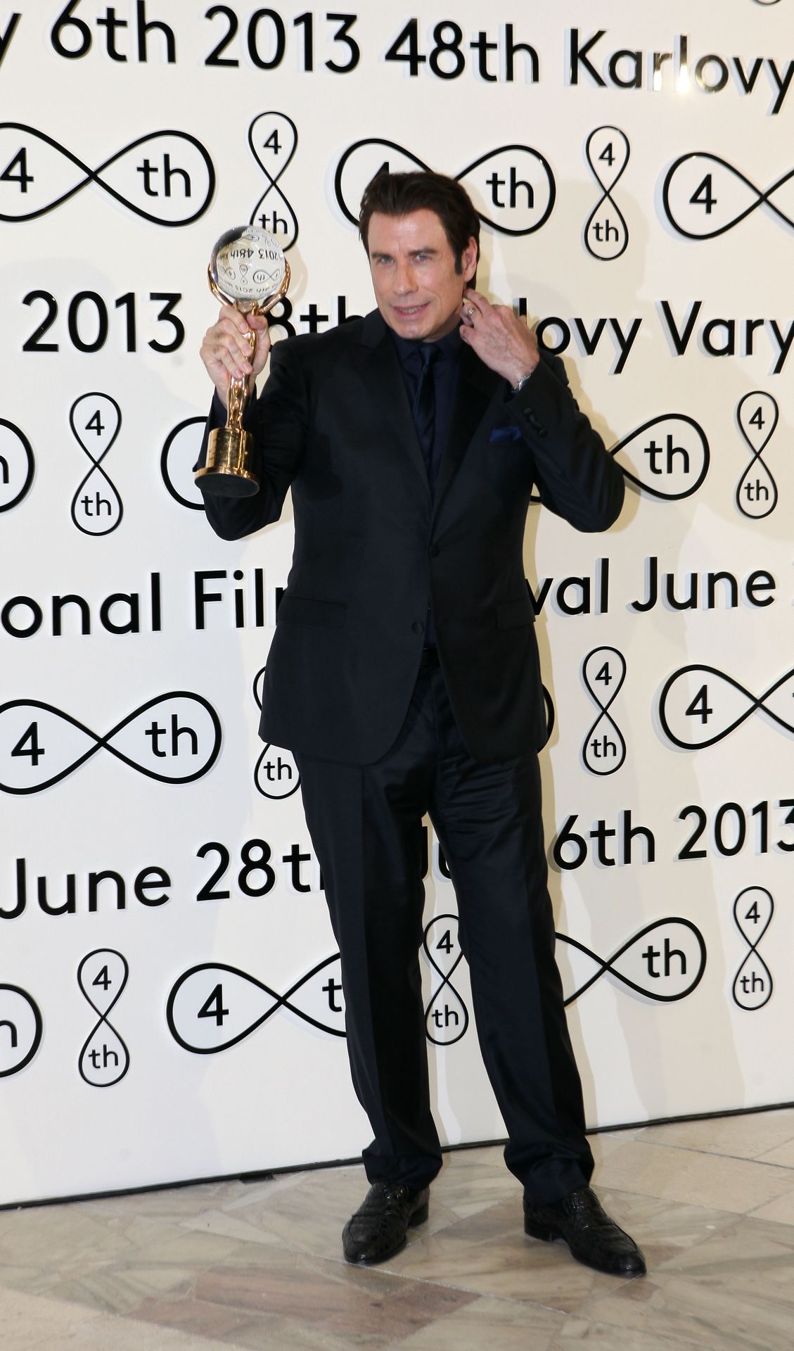 John Travolta s cenou na MFF v Karlových Varech - GALERIE: Jak šel čas s Johnem Travoltou (2/8)