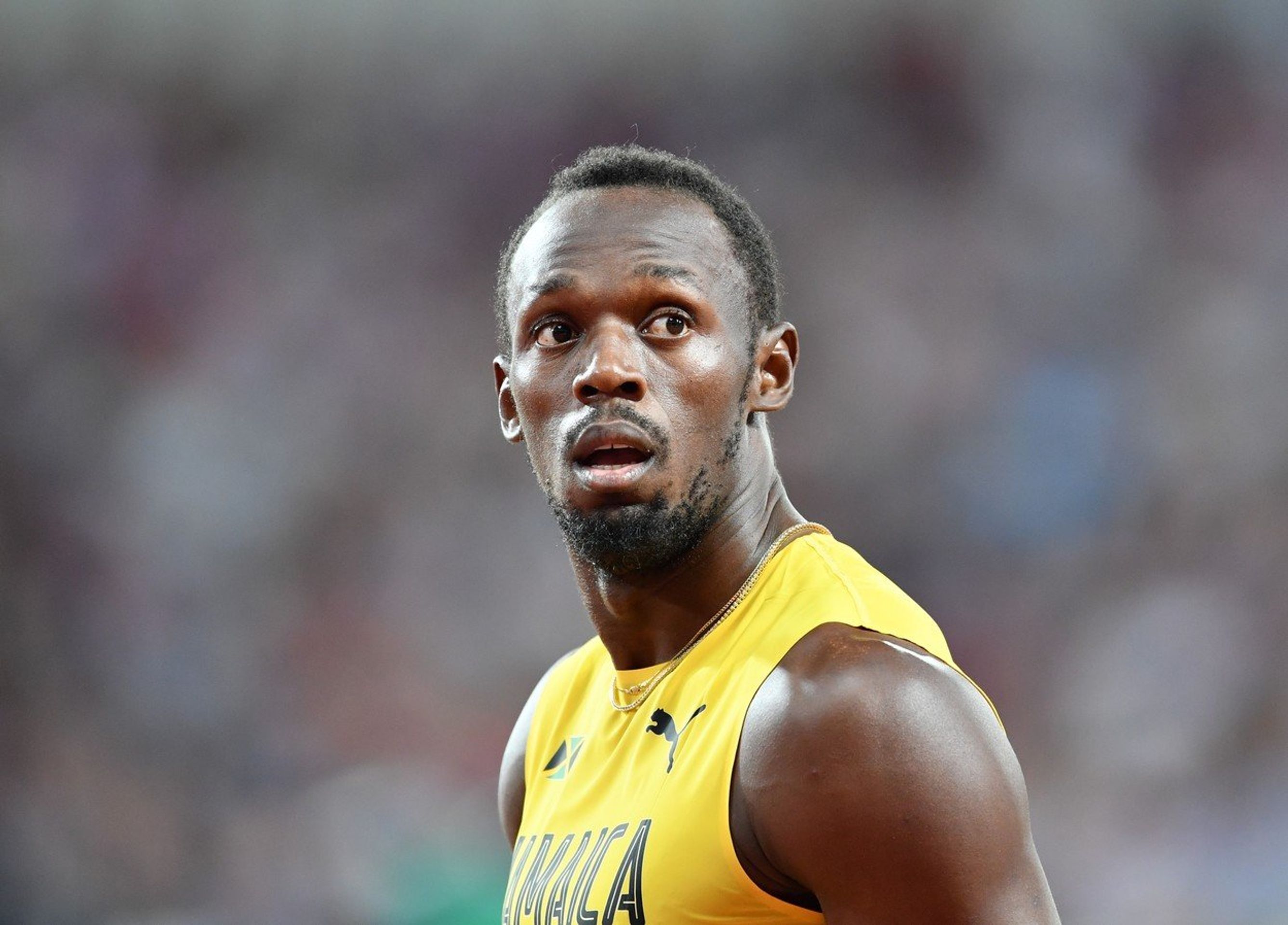 Usain Bolt nemohl uvěřit svým očím - GALERIE: Bolt se loučil s kariérou, s ním se zase loučil odvážný naháč! (5/6)
