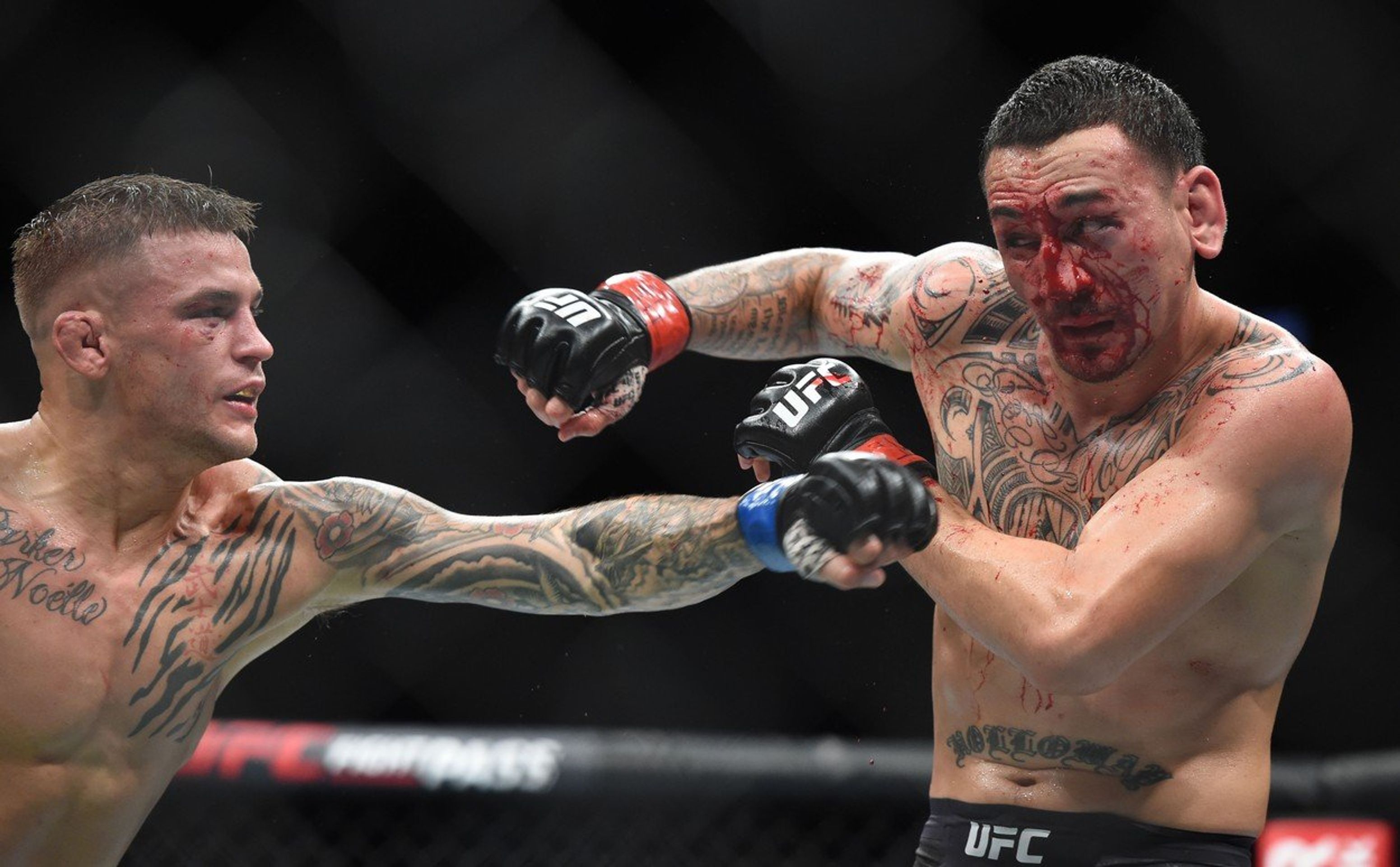 Dustin Poirier a Max Holloway - GALERIE: Dustin Poirier vybojoval prozatimní titul v lehké váze (2/4)