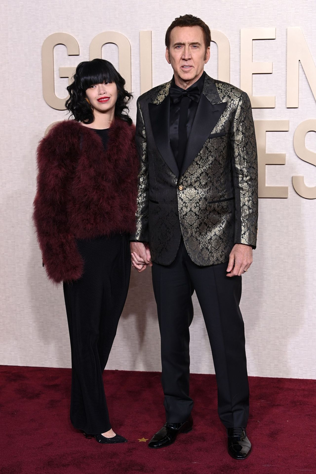 Nicolas Cage a Riko Shibata, 7. 1. 2024 Zlaté glóby - Zlaté glóby 2024 (15/15)