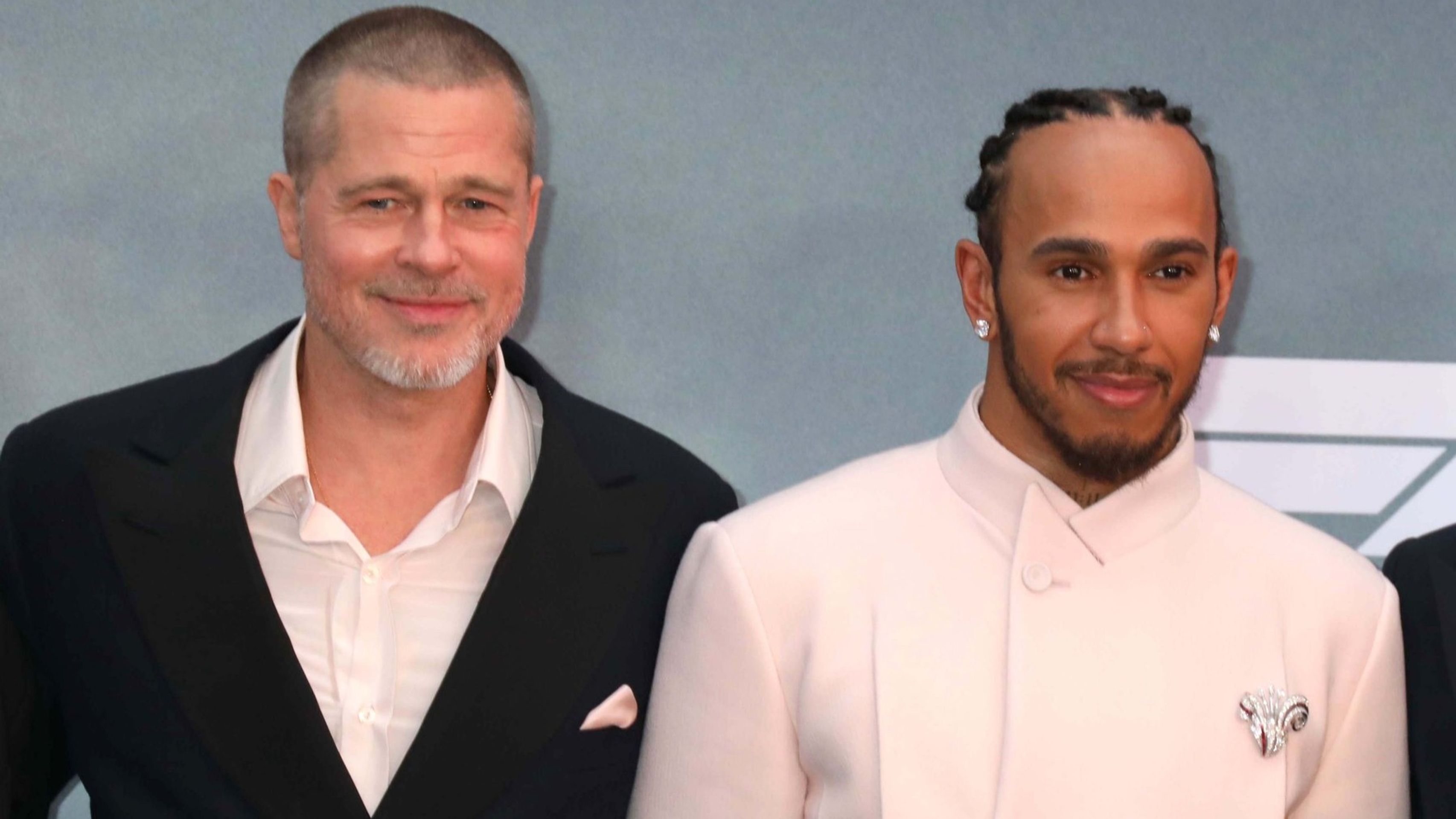 Brad Pitt (vlevo) a Lewis Hamilton - Sportovci a celebrity při premiéře filmu F1 (2/5)