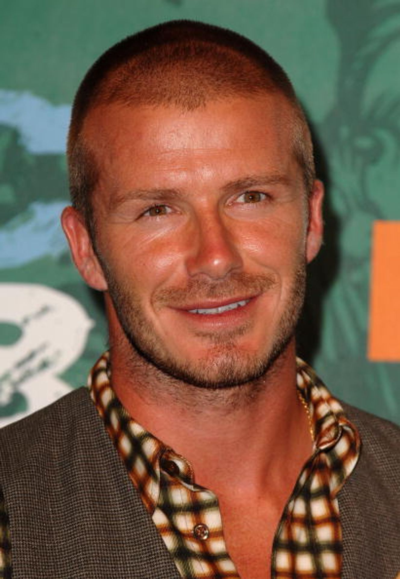 David Beckham a jeho účesy - 14 - GALERIE: David Beckham ve světě módy (5/18)