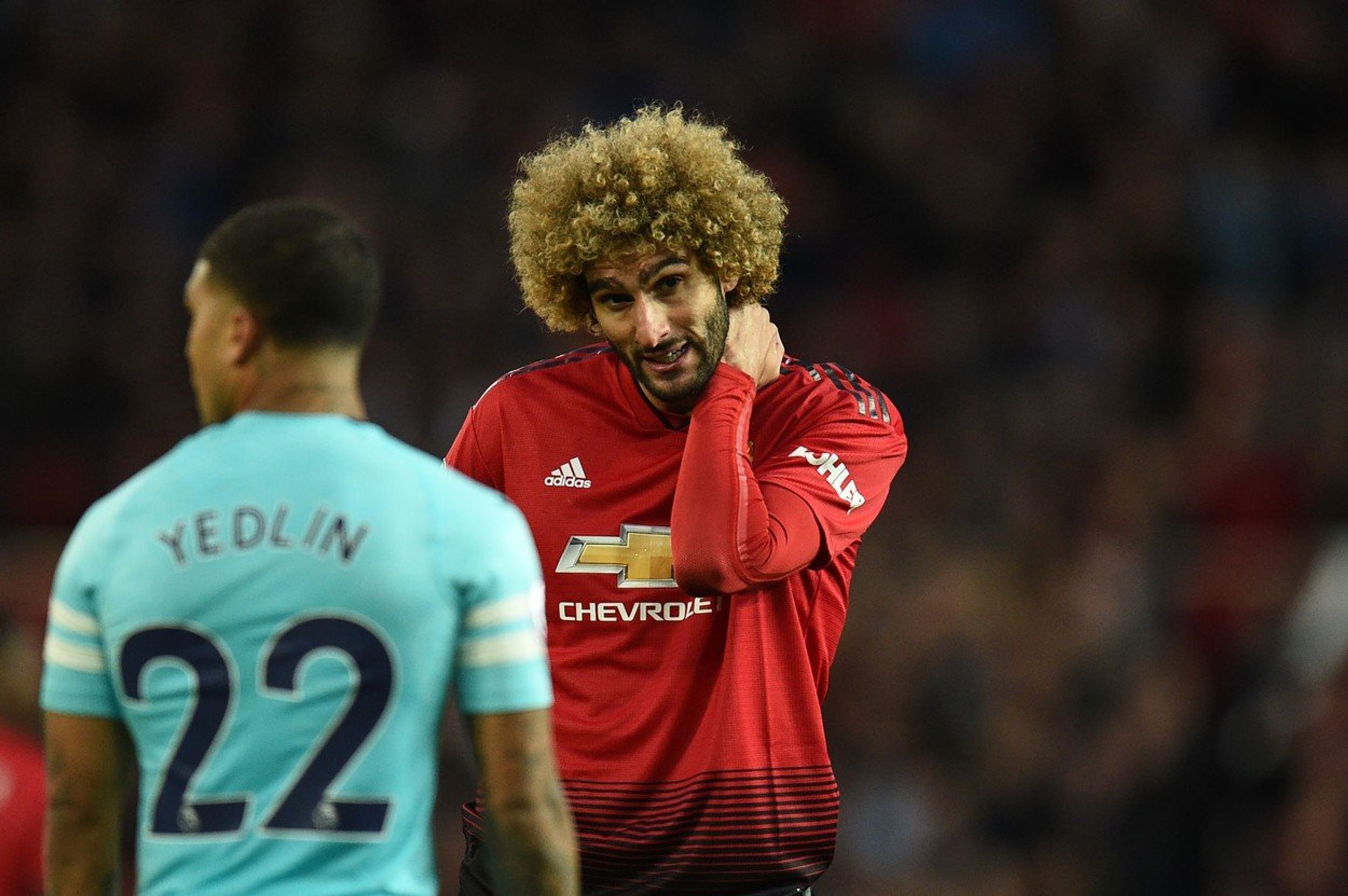 Marouane Fellaini - GALERIE: Marouane Fellaini si oholil své legendární afro (3/4)