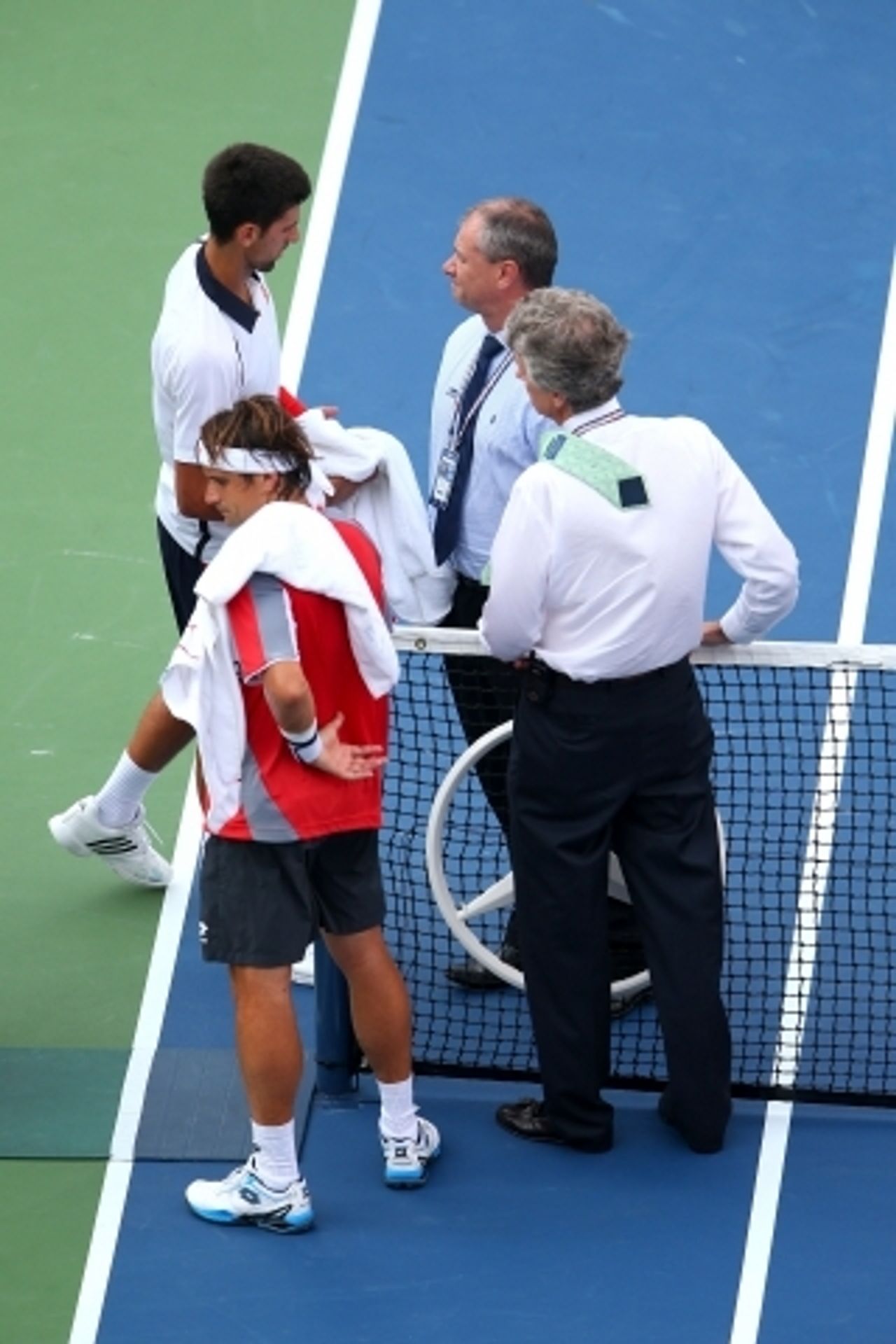 GALERIE: Počasí řádilo na US Open - 8 - GALERIE: Počasí řádilo na US Open (10/10)