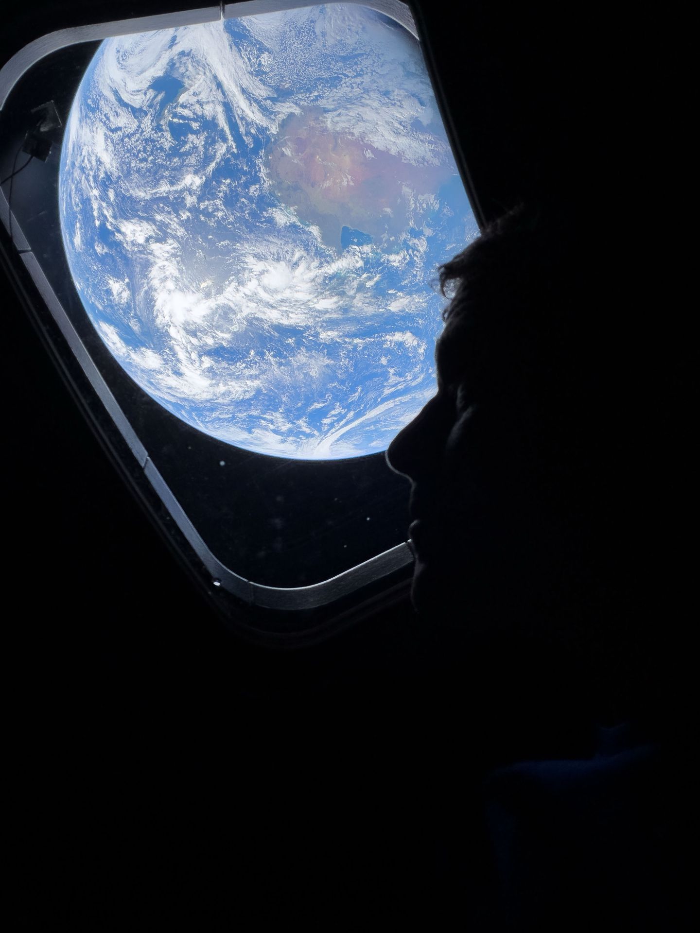 Reid Wiseman na palubě lodi Orion - Fotografie z vesmíru (1/4)